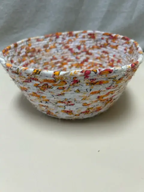 Signed ORANGE/WHITE FABRIC BASKET