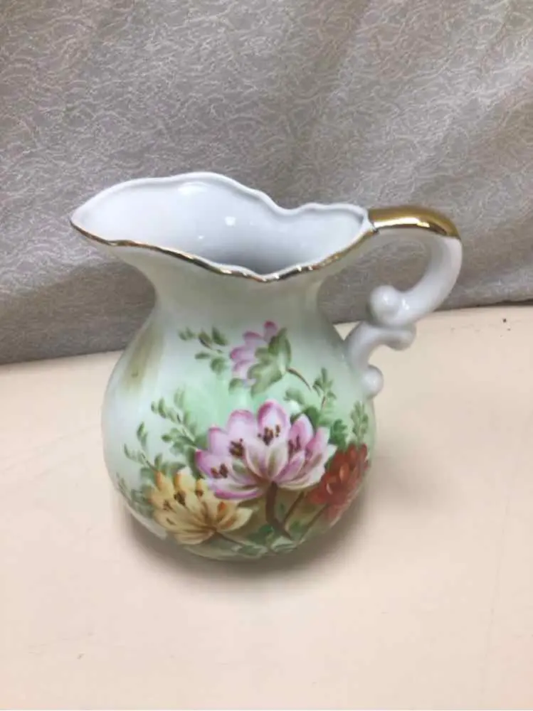 IVORY FLOWERED PITCHER
