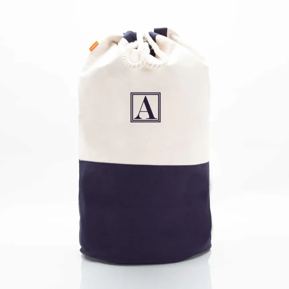 MONOGRAM CANVAS DRAWSTRING JET-BLACK LAUNDRY DUFFLE Wheels